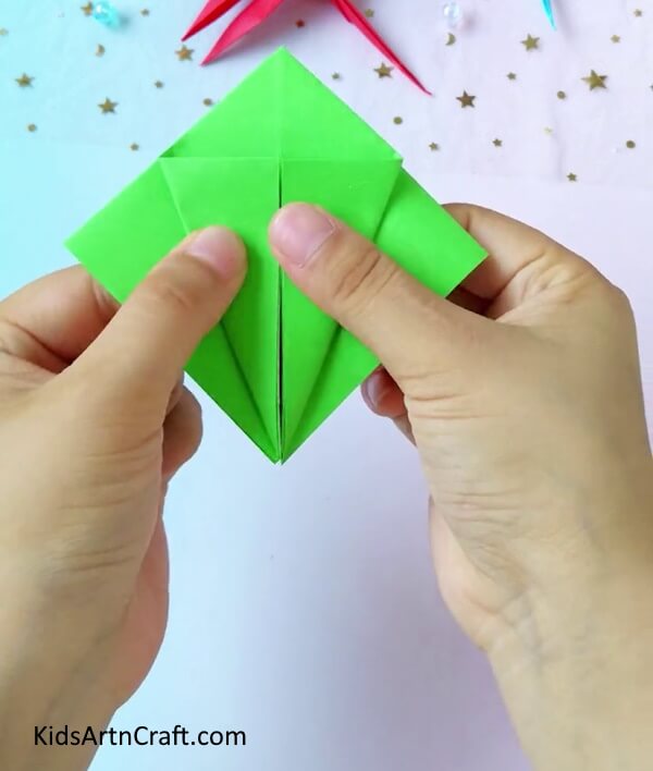 Folding The Paper To Form A Kite Shape- Making a dragonfly from origami paper, especially for young ones.