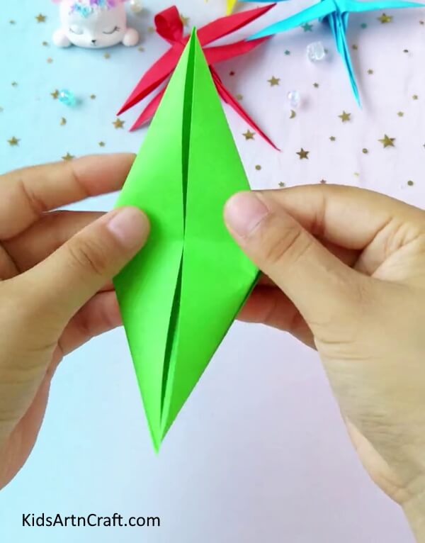 Again Making A Rhombus From The Other Side- A simple tutorial on creating a dragonfly from origami paper for youngsters.