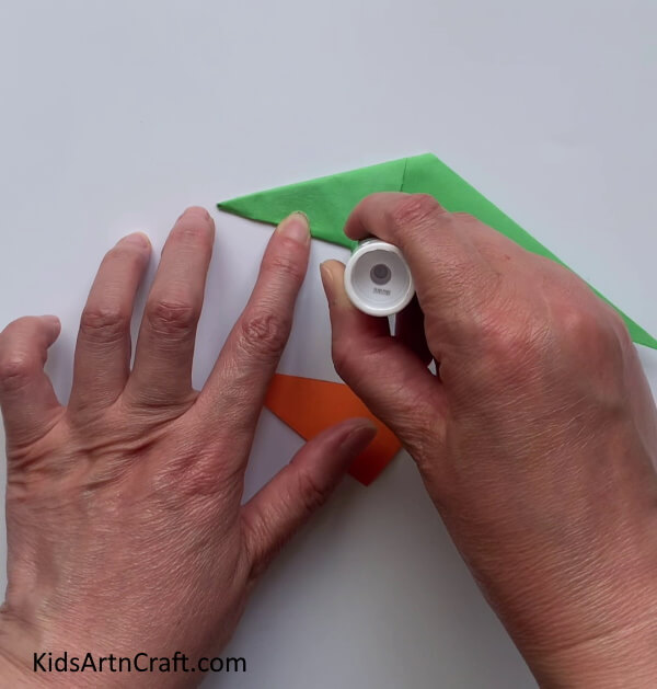 Applying Glue - Developing an Endearing Paper Bird Finger Puppet For Children