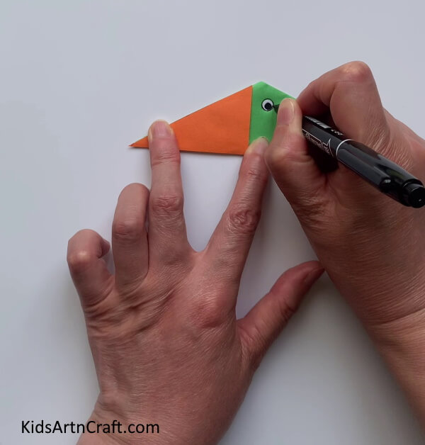 Making Eyes Of The Bird - Create a Cute Paper Bird-Shaped Finger Puppet For Kids