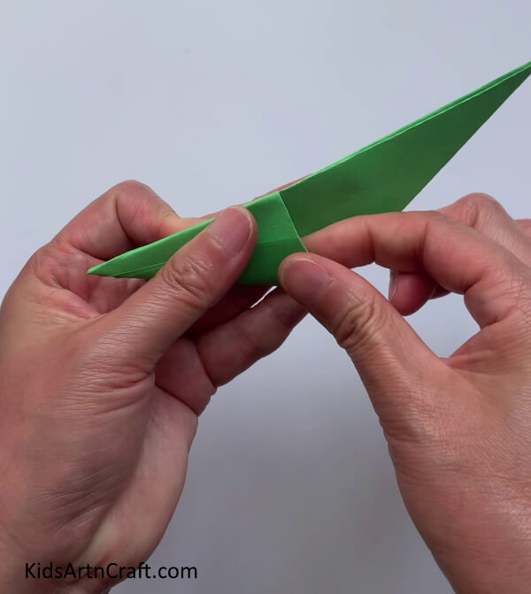 Tucking In Left Paper - Constructing a Cute Paper Bird Finger Puppet For Kids