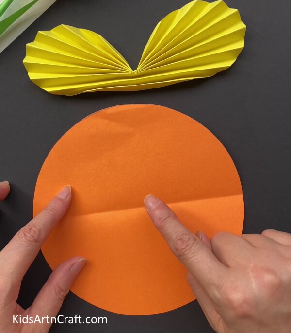 Taking An Orange Circle Of Paper - Designing a Paper Butterfly -- An Effortless Instruction for Children 