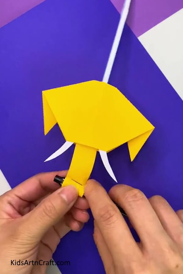 Shaping The Trunk- This craft is an easy way for kids to make a paper elephant with a moving trunk.