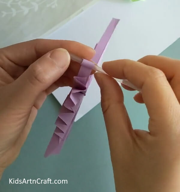 Rolling The Antennas- Learn how to make a paper origami butterfly - a tutorial specifically for kids.