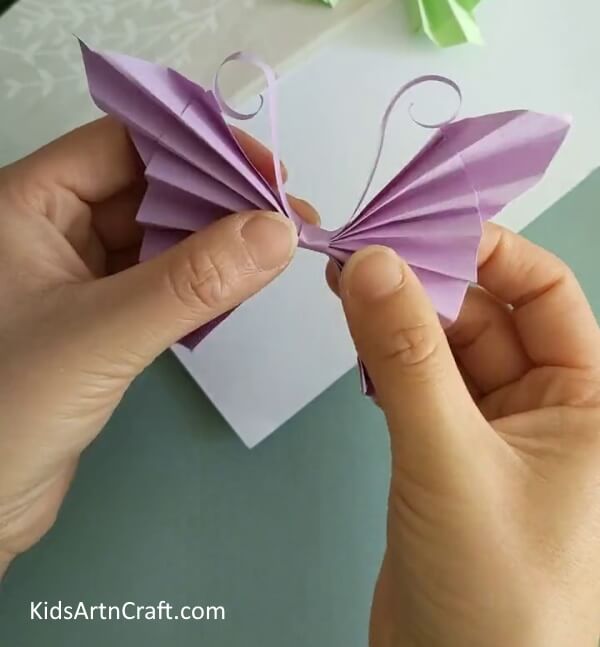 Shaping The Sheet Properly- A tutorial on making a paper origami butterfly - perfect for little ones.