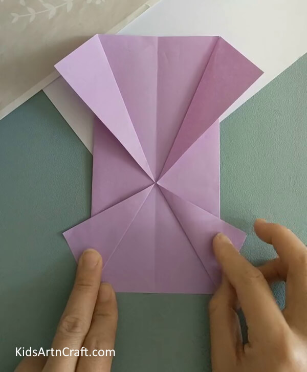 Making Folds On The Bottom Side As Well- How to make a Paper Origami Butterfly - a guide for young ones