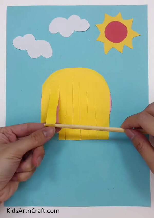 Rolling The Vertical Strips - Create a Princess Out of Paper with This Step-by-Step Tutorial
