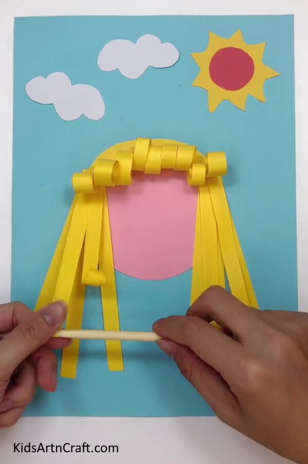 Rolling The Hair Strands - Learn to Make a Paper Princess Through This Tutorial