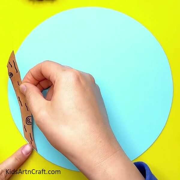 Pasting A Tree Branch- Chirpy birds creating a leafy masterpiece for children. 