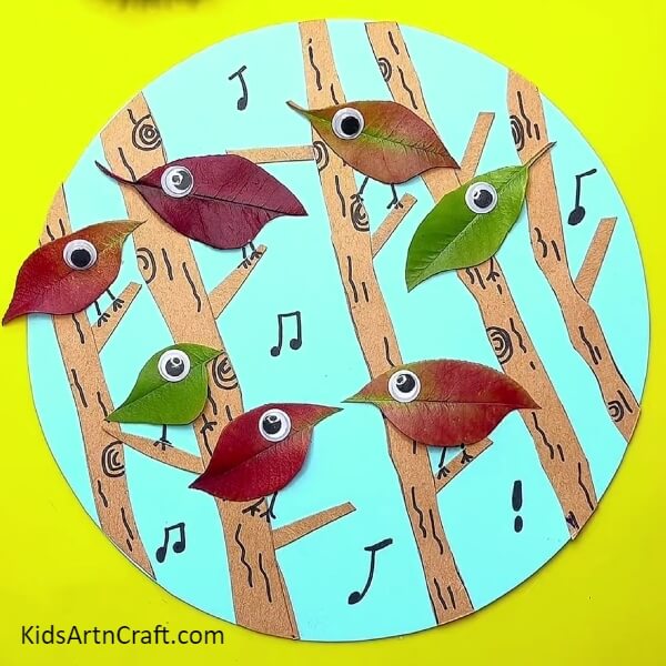 Your Birds Singing Craft Is Ready!- Kids learning how to create leafy art with bird music. 