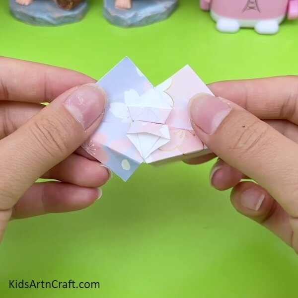 Unfold All The Sides From Behind to look Pretty Origami Umbrella- This Creative Craft Tutorial Teaches Kids How to Make an Origami Umbrella