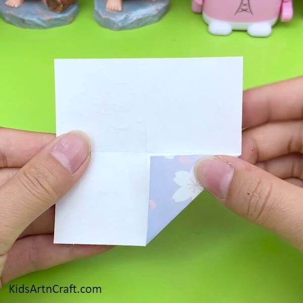 Fold The Printed Craft Paper with your hand for Creative Craft Tutorial For Kids
