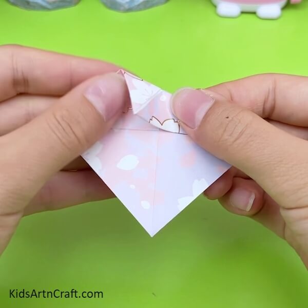 Fold The Other Side In The Same Way As Above by repeated the same step for kids- Guide for Crafting a Lovely Origami Umbrella with Children 