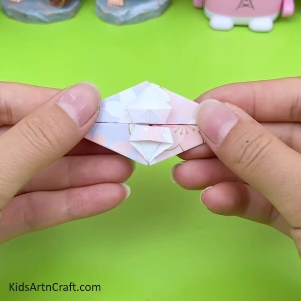 Repeat The Same Process step by step for the kids - This Tutorial Makes it Simple to Craft an Origami Umbrella with Kids 