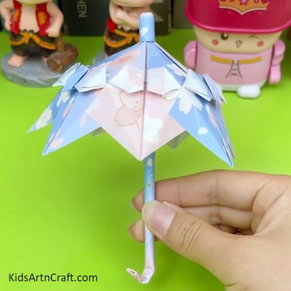 Completed! Your Cute little umbrella is ready to protect you - Learning How To Make An Origami Umbrella - An Educational Craft For Kids 