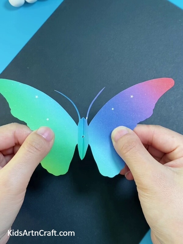After Cutting Along The Border Of The Butterfly, Unfold The Sheet- How to make an attractive paper-straw butterfly for kids