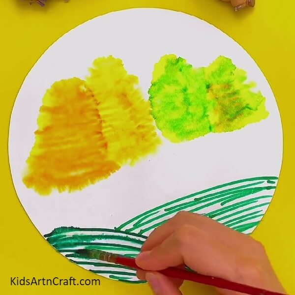 Wet Blending the Colour of the Ground with a rush Sketchpen Painting Art Idea For Kids