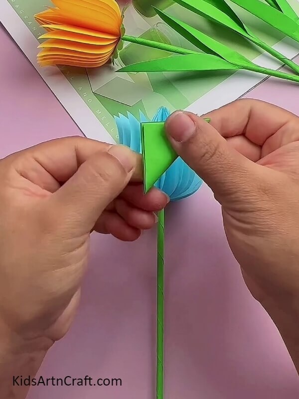 Fold the Green Craft Paper Into Triangle- Fun and Easy Tulip Flower Art Tutorial For Little Ones