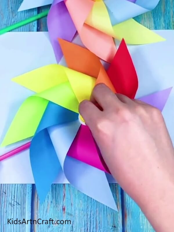 Pasting Small Piece of Clay with Wire- How to Assemble a Rainbow Paper Windmill for Novices 