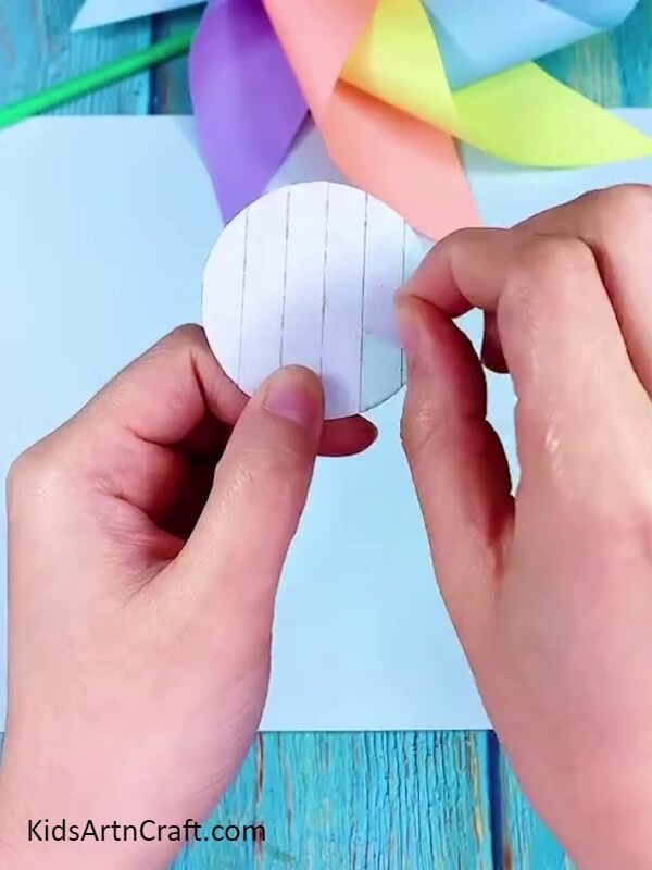 Cutting Single Sided Foam Tape in Circle Shape- A Guide to Constructing a Rainbow Paper Windmill for Starters 