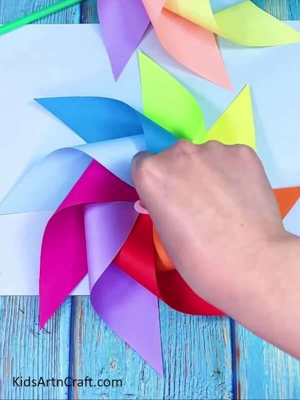 Pasting Small Piece of Foam Tape- A Walkthrough on Crafting a Rainbow Paper Windmill for Newcomers 