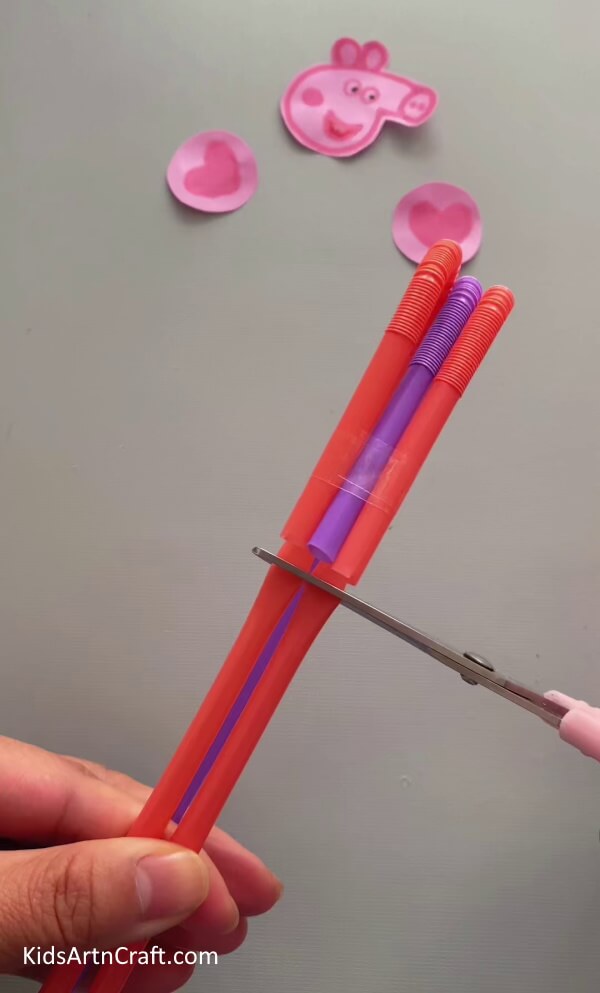 Cutting the Red Straws- Children can learn to make a Peppa Pig decoration out of used paper cups with this tutorial. 