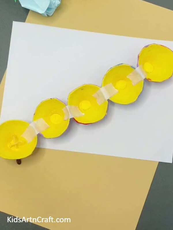 The Caterpillar's Body- Create a Cute Caterpillar Out of a Repurposed Egg Carton with This Fun Craft Tutorial for Kids 