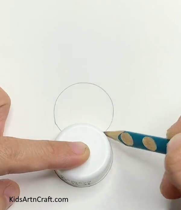 Below That Circle, Draw Another Circle But Not Completely- Fabricating a Paper Penguin Toy that Rocks from Bottle Cap and Clay