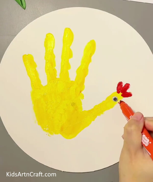 Eye of the Hen-Here is an easy tutorial to teach your kids how to make a handprint hen. 