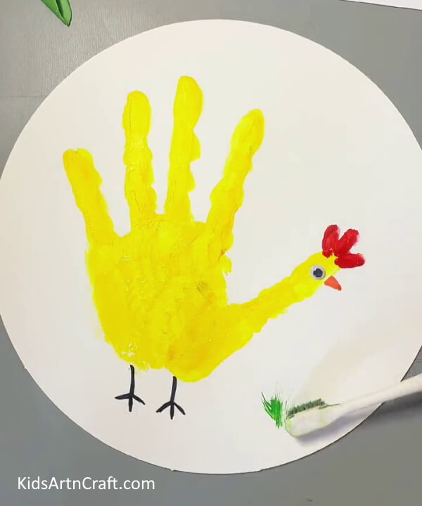 Making A Green Grass-Follow this guide to make a handprint hen with your kids
