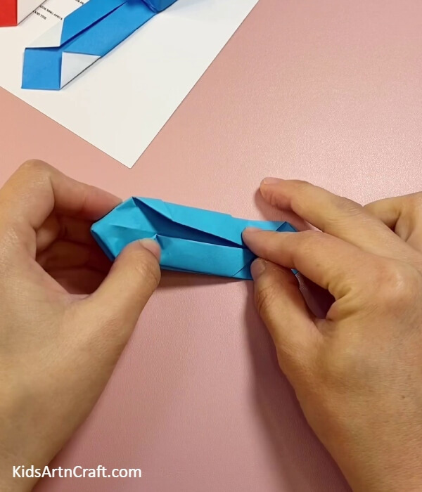 Now Fold Its Outer Edges-A do-it-yourself paper timepiece crafted with origami