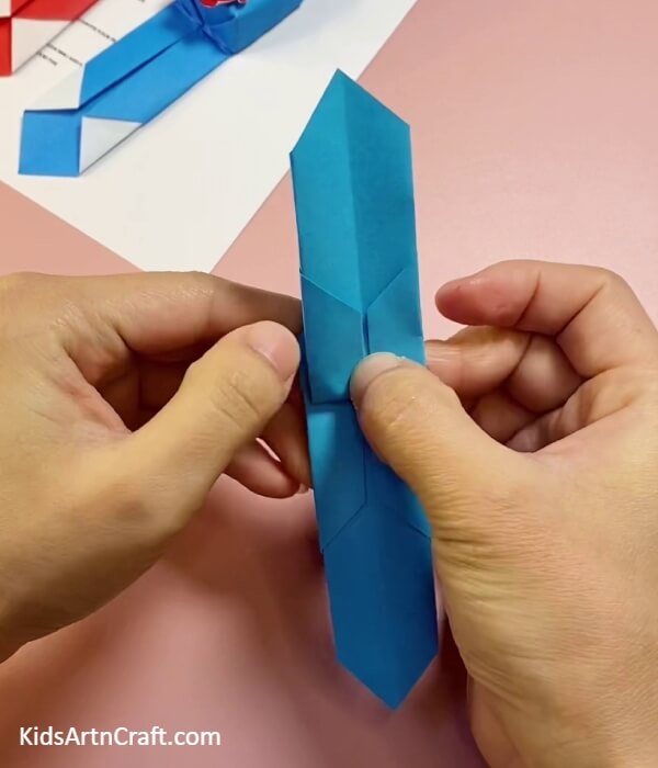 Fold The Flaps Inwards- Develop a paper watch with origami in the house.