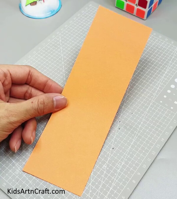 Cutting Out A Rectangle Of Orange Paper - Here is how to make a tiger out of paper, step-by-step instructions