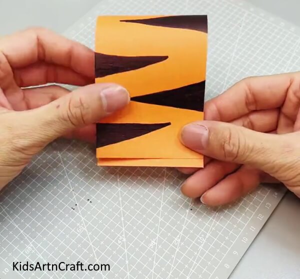 Folding The Paper - Learn how to build a paper tiger, step-by-step