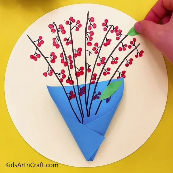 Sticking The Leaves- Inspiring Art Project For Kids: A Miniature Bouquet of Red Flowers