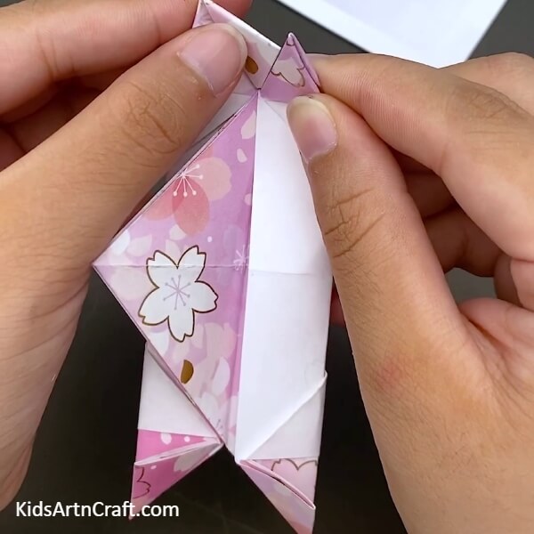 Making The Sides Stand in your hand for Unique Paper Origami Boat- Detailed instructions on how children can build a Paper Origami Boat