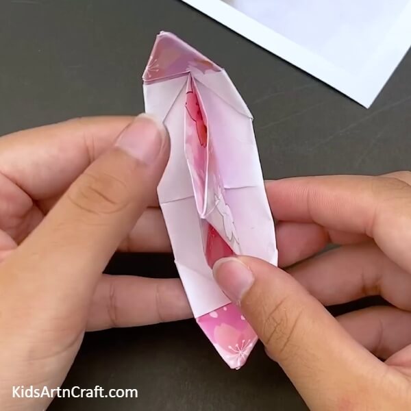 Sealing The Corners Of The Other Side As Well Step-by-step Tutorial For Kids- An Easy-to-Follow Tutorial for Kids to Fashion a Paper Origami Boat 