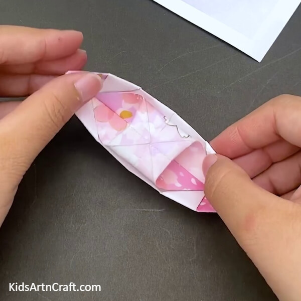 Fixing The Triangle On The Top for looking better- Comprehensive Directions to Help Children Fabricate an Origami Boat With Paper 