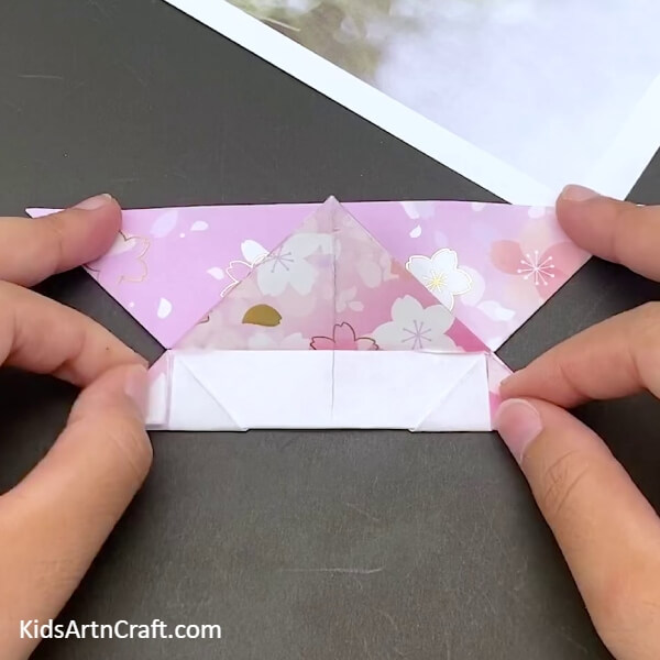Making Another Triangular Fold To Making a Paper Boat Using Paper-