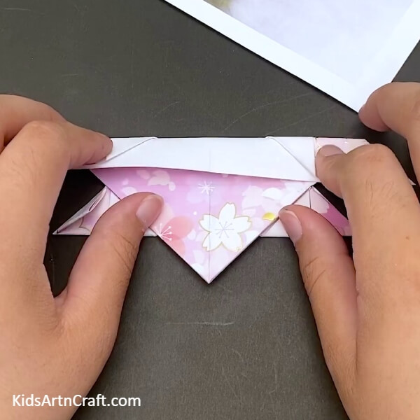 Making A Horizontal Fold On The Top Part Of The Sheet Out of Paper for kids- A comprehensive tutorial on making a Paper Origami Boat with kids 