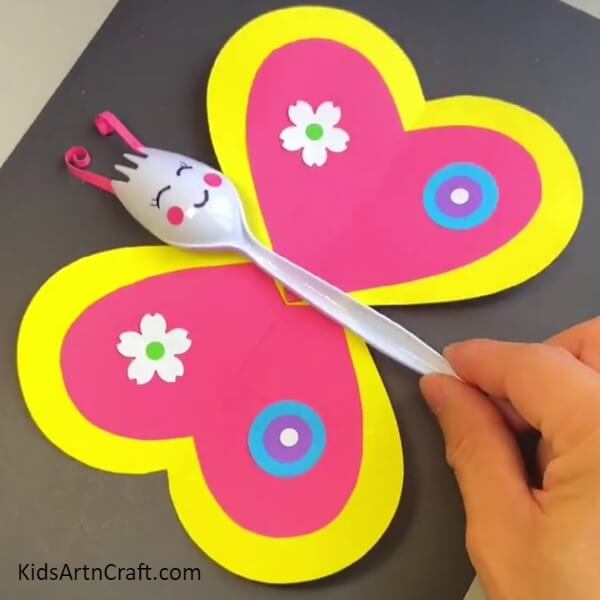 Your Paper-Spoon Butterfly Is Ready! - An eye-catching butterfly craft can be made for children using a single-use spoon.