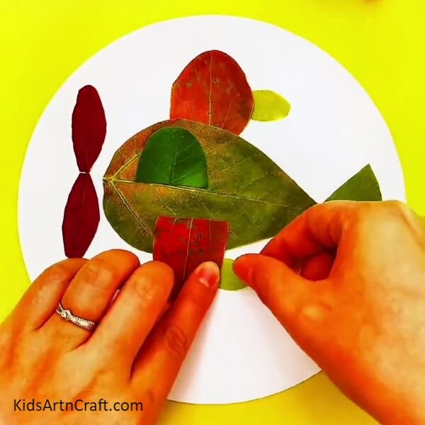 Picking up those yellowish - green leaves- Inventive Airplane Leaf Crafting for Newbies 