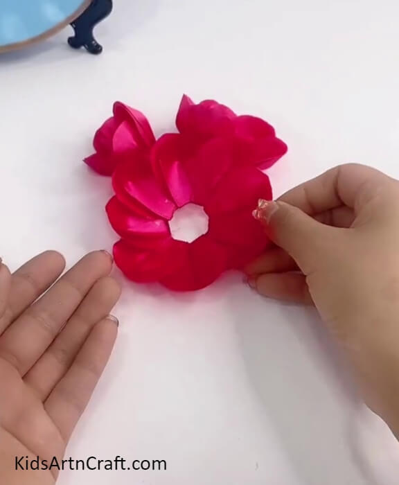 Making More Layers Of Petals-Directions for Creating a Faux Floral Creation for Kindergarteners