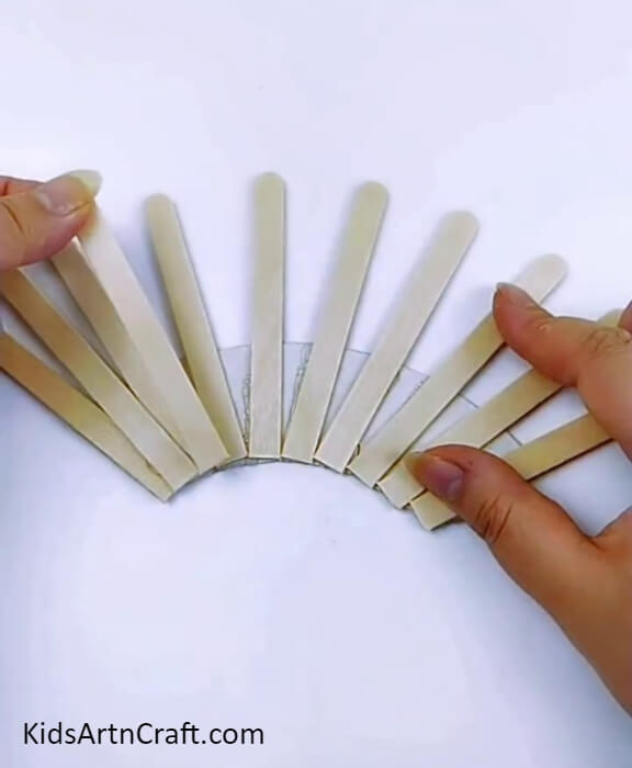 Pasting Another Layer Of The Sticks-Innovative Popsicle Stick Blossom Vase Project for Beginners