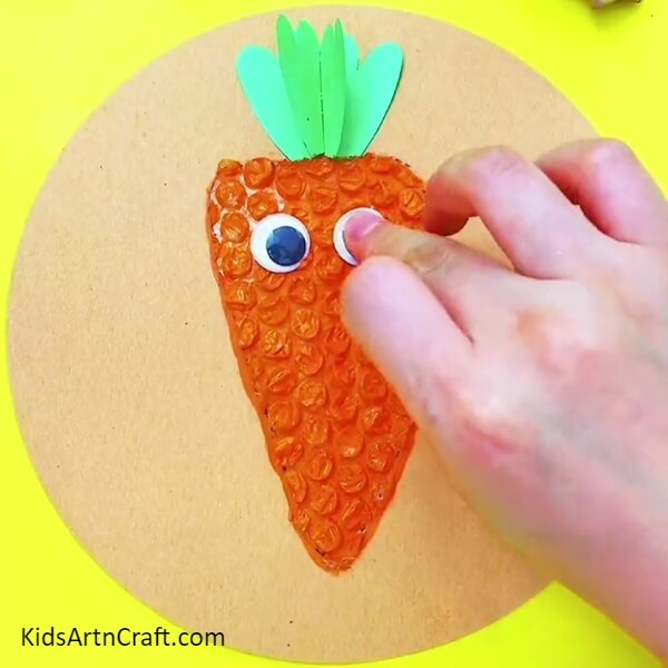 Pasting Googly Eyes - Amazing Carrot Creation With Bubble Wrap For Starting Out 