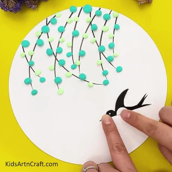 Paste the bird- Follow Directions to Make a Lovely Bird Fly Under the Tree 