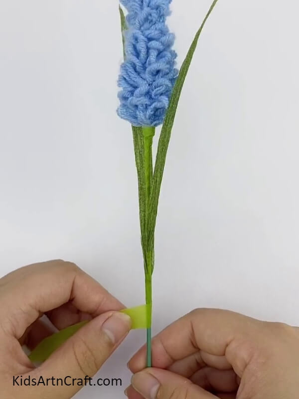 Tape the leaves with the flower stem- Blue Lavender Threads and Ropes Formed into 3D Flowers - An Idea for Youngsters 