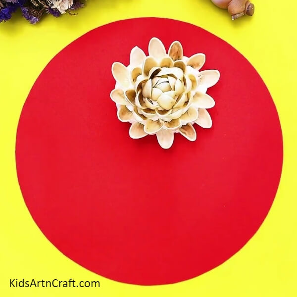 Keep Sticking The Shells Around The Shells- Lovely Peanut Shell and Rose Garden Craft suitable for children.