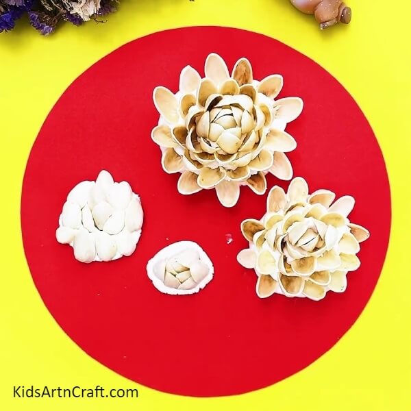 Continue The Process Of Making Shell Flowers-An alluring Peanut Shell and Rose Garden Craft intended for kids