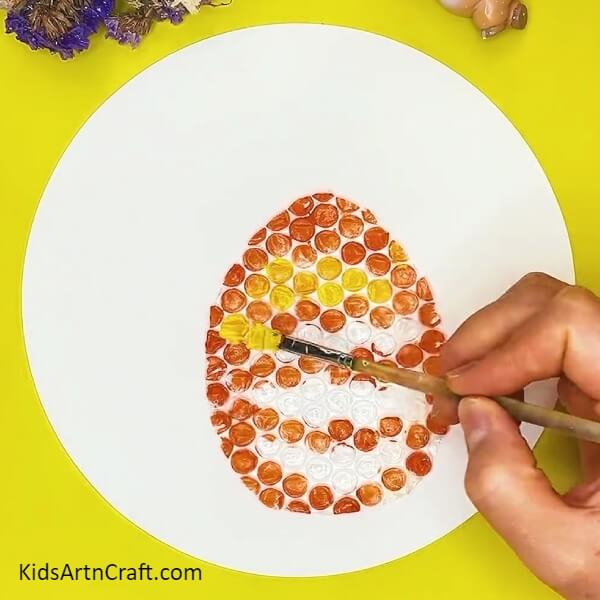 Add Yellow in the rest and give it a Ombre effect- How To Teach Kids To Make A Bubble Wrap And Honey Bee Comb Art Piece